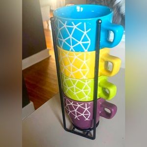 4 coffee mugs with holder. Used for decoration never used.